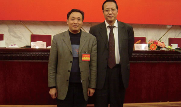 與原農業部副部長、中國畜牧業協會會長張寶文合影